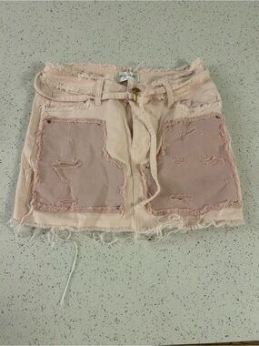 First Row: Distressed Pink Patch Mini Skirt